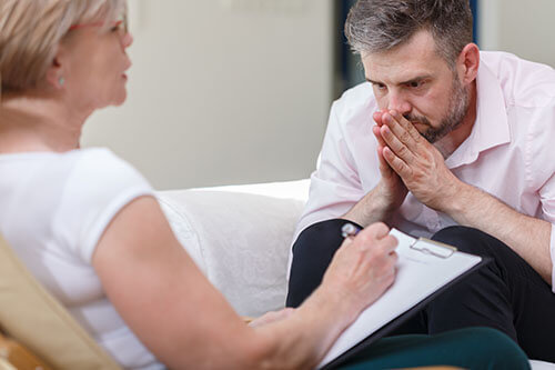 man goes to individual mental health therapy