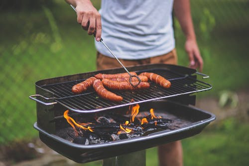 man grilling