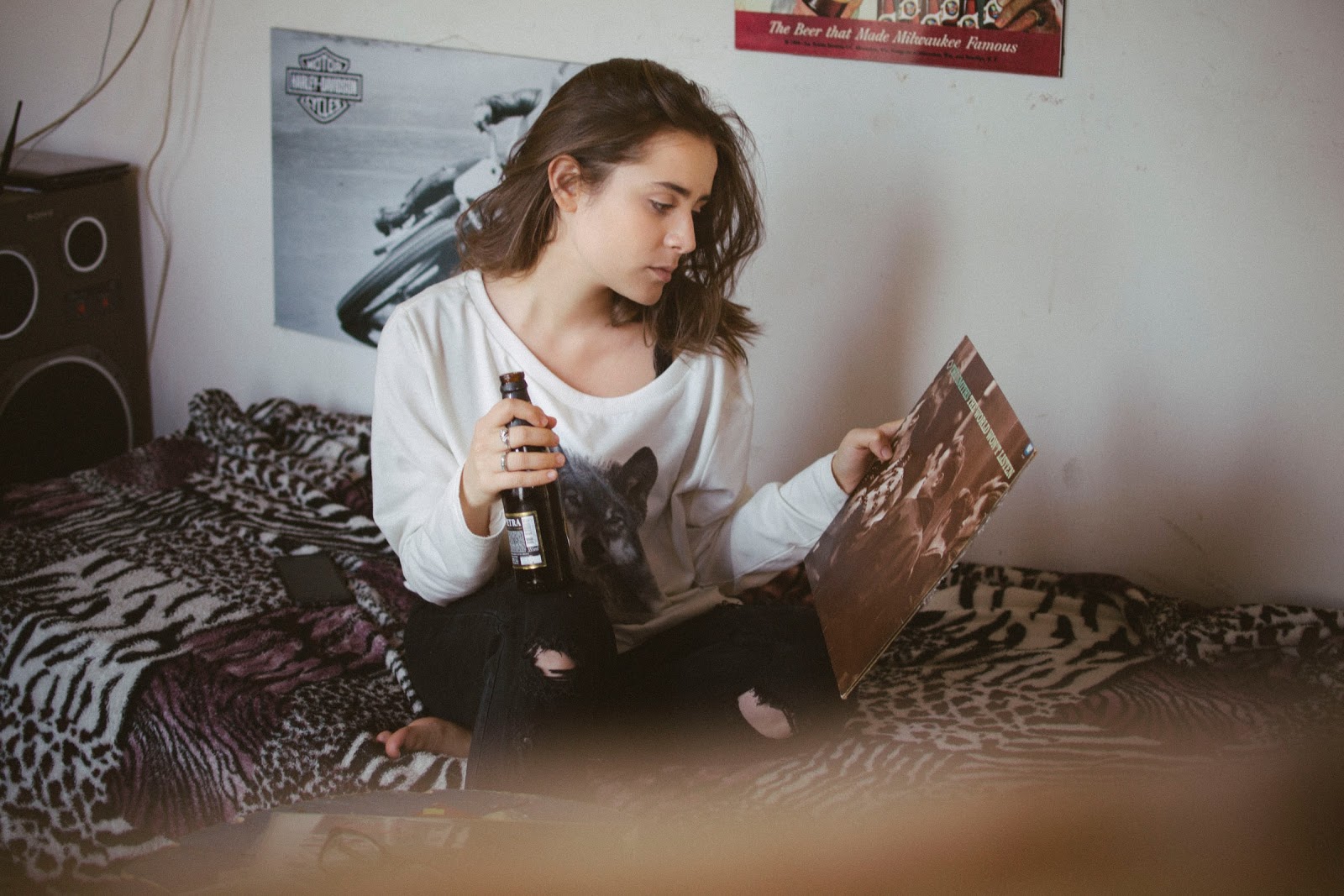 Teen Girl Drinking on Bed